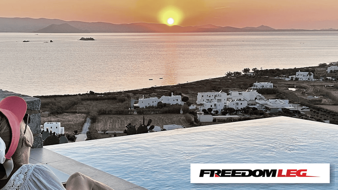 Freedom Leg patient watching sunset over the Greek islands, using a hands-free crutch